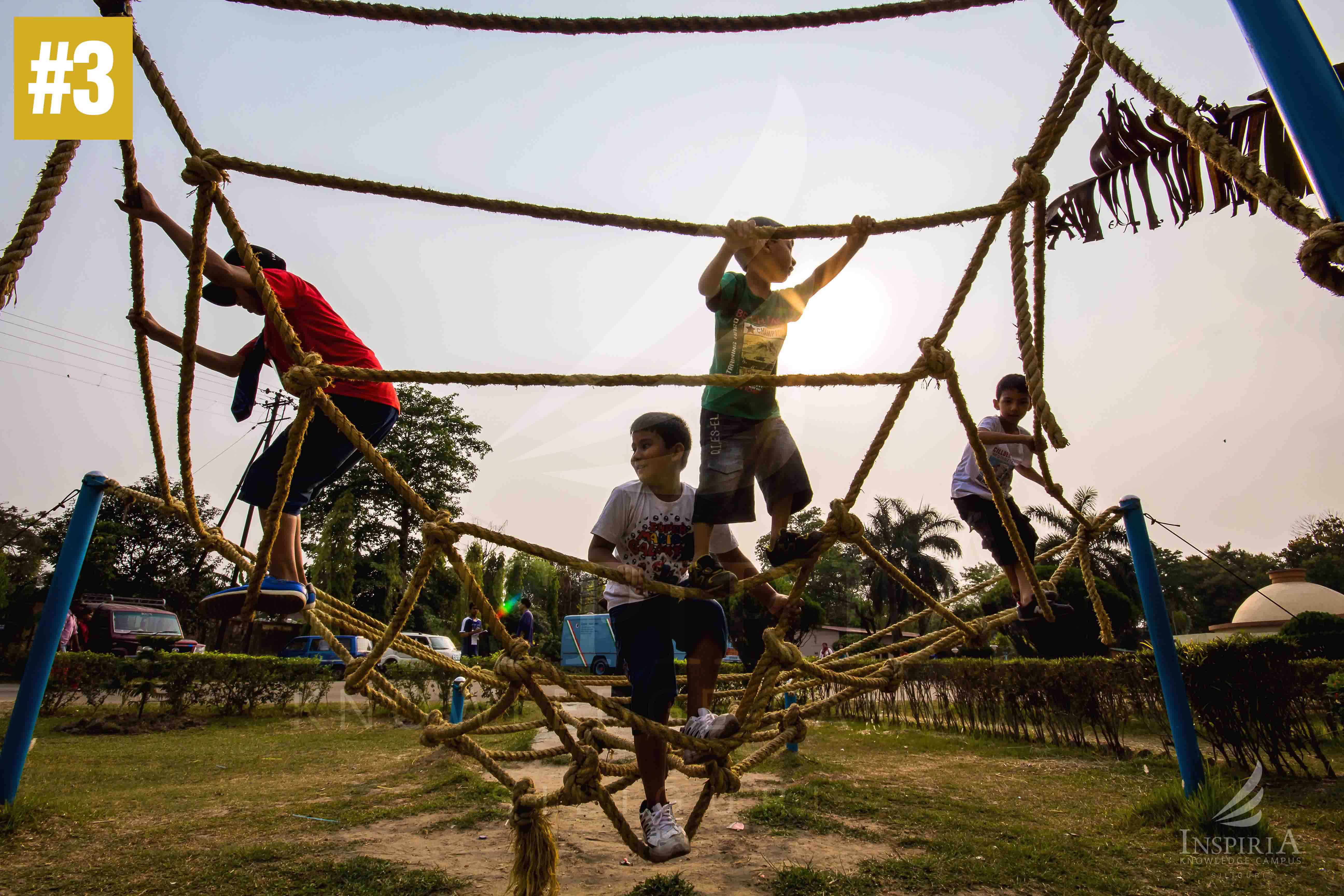 Boys playing at siper web at Science city siliguri