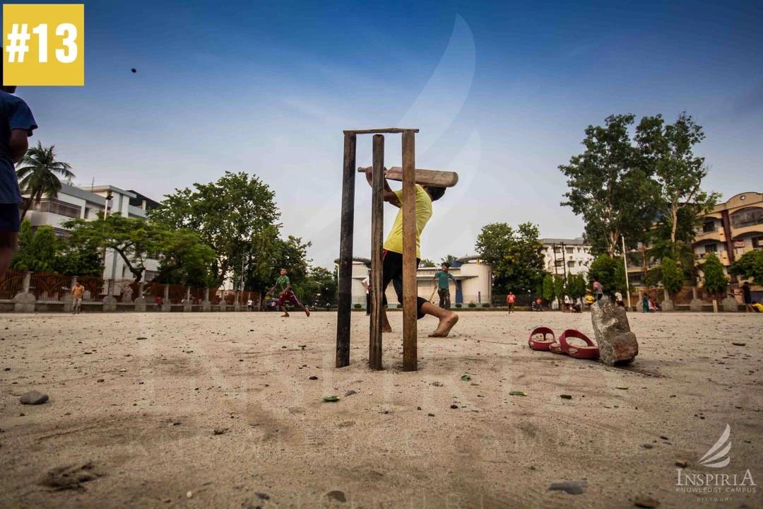 Children playing cricket at Baghajatin Park, Siliguri