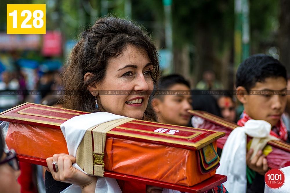 Foreigner carrying holy book